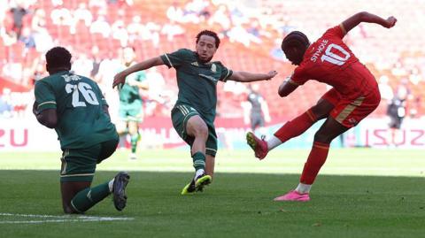 Ronald Sithole shoots at goal