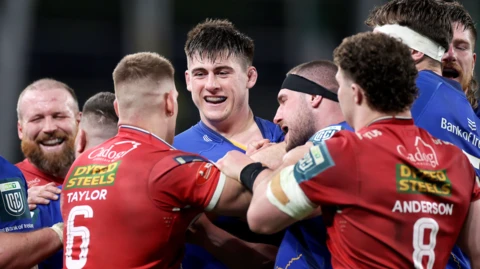 Tempers flare between the sides during the game as Fletcher Anderson, Jarrod Taylor and Dan Sheehan face off