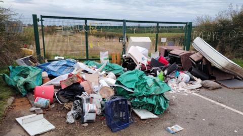 Fly-tipping outside the entrance to a former fracking site on Preston New Road, Little Plumpton in Fylde, Lancashire