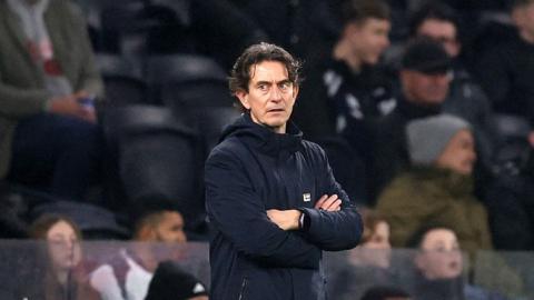 Thomas Frank with arms folded 