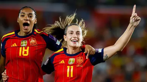 Alexia Putellas and Salma Paralluelo celebrate