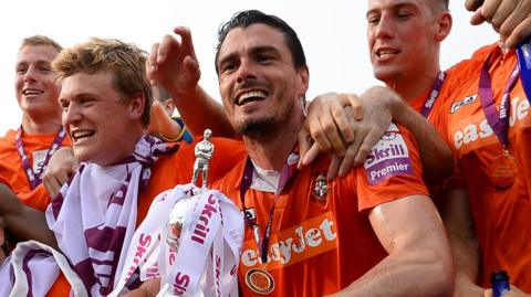 Ronnie Henry celebrates Luton's Conference title win