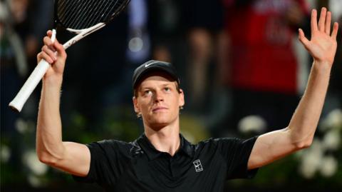 Jannik Sinner celebrates after his comeback win at the Italian Open