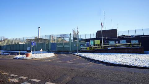 A view of the front of HMP Huntercombe in December 2022.