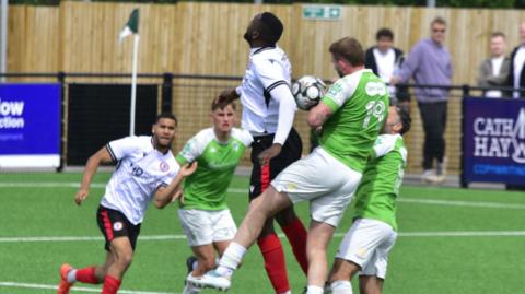 Action from Guernsey FC v Horsham YM