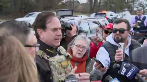 Sheriff Michael Bouchard speaks to press.