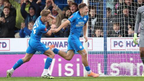 Harry Leonard (right) scored his first goal for Peterborough since joining from Blackburn in September.