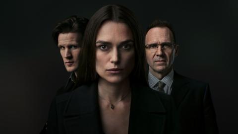 Three people looking at the camera