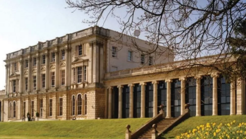 Caversham Park House from the right side, showing a green back in front of the house