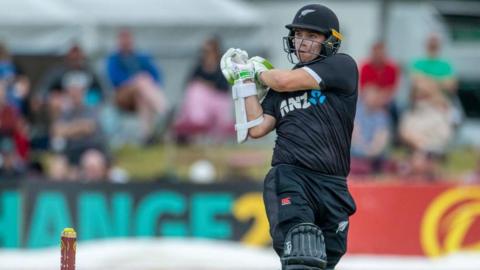 Tom Latham hooks a boundary for New Zealand against Ireland.