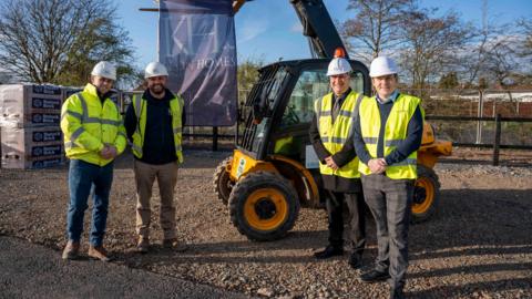 L-R): Harvey Brand, Keon Homes Site Manager, Matt Wilkes, Keon Homes Project Manager, Cllr Steve Evans, City of Wolverhampton Council Deputy Leader and Cabinet Member for City Housing, George Williams, City of Wolverhampton Council Service Manager Housing
