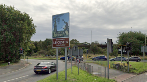 A Welcome to Leicester sign on the edge of the city 