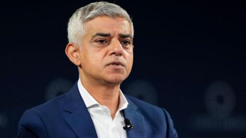 Headshot of Sadiq Khan with neutral expression