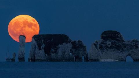 Strawberry Moon rising - taken from Swanage, Dorset
