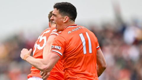 Rory Grugan celebrates