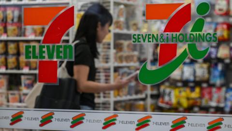 Customer at a 7-Eleven convenience store in central Tokyo.