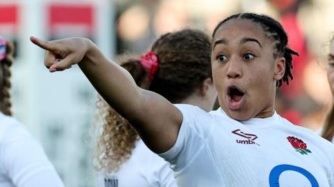 Sadia Kabeya points and shouts while in action for England