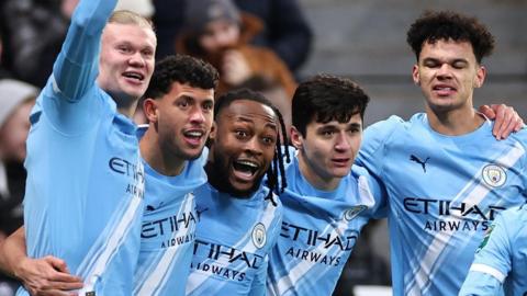 Man City players celebrate