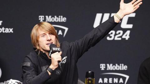 Paddy Pimblett gestures at the UFC 324 news conference