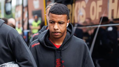 Humza Igamane steps off the bus in Paisley