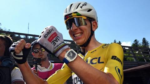 Tadej Pogacar celebrates after winning stage 10 of the 2026 Tour de France