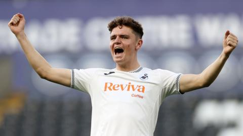 Swansea goal-scorer Bobby Wales celebrates