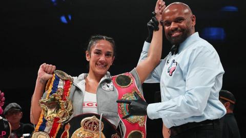 Amanda Serrano with her titles
