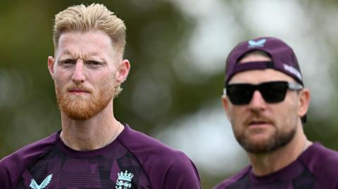 Ben Stokes and Brendon McCullum look on