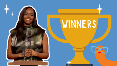 Oti Mabuse in front of an illustrated gold trophy. 