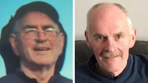 Des Holmes on the left is wearing a navy polo top, silver glasses and a cap. It is an old photograph. Sam on the right is smiling at the camera and wearing a navy jumper. He has a thick moustache and grey hair on the side of his head. 