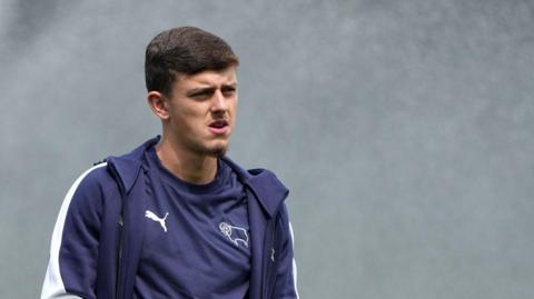 Owen Beck pictured in a Derby tracksuit