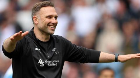 John Eustace on the touchline
