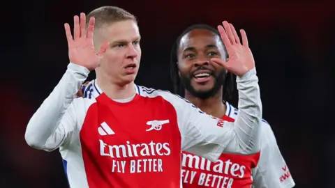 Oleksandr Zinchenko celebrates after scoring for Arsenal