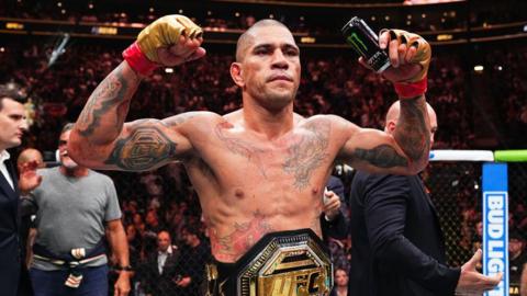 Alex Pereira raises his fists in the air to celebrate beating Khalil Rountree Jr in 2024