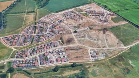 Google Earth 3D view of the initial work at Thorpebury, with dozens of houses being built on fields