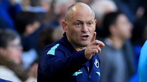 Alex Neil on the touchline