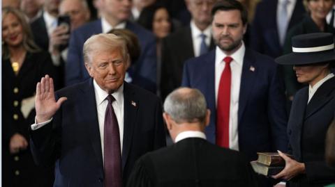 Mr Trump being sworn in as President 