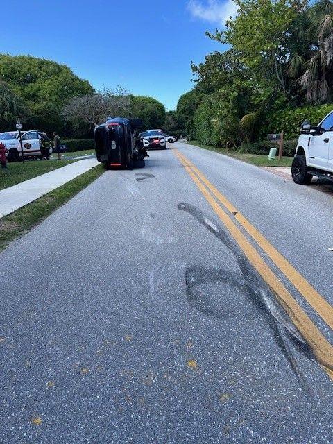 Tiger Woods' car is seen on its side and skid marks show where he crashed and lost control
