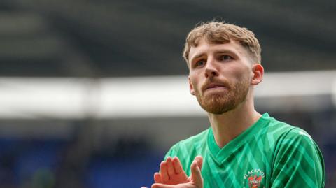 Daniel Grimshaw in action for Blackpool