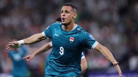 Ali Al-Hamadi celebrates scoring during the 2026 World Cup qualifiers final play-off football match between Iraq and Bolivia