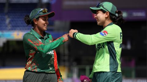 Nigar Sultana Joty of Bangladesh (L) shares a joke with Fatima Sana of Pakistan (R) 
