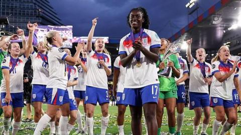 Michelle Agyemang applauding in front of the England squad after winning Euro 2025