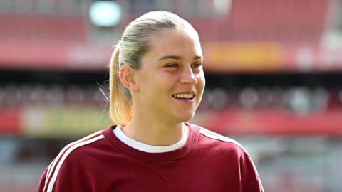 Alessia Russo looks on