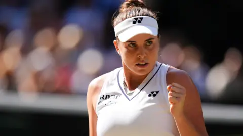 Karolina Muchova hits a forehand