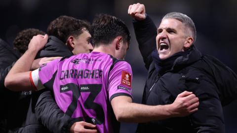 Ryan Lowe celebrates Wigan's FA Cup win over Preston