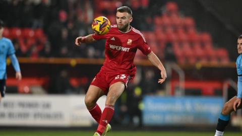 Aaron Drinan of Swindon Town in action