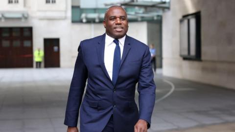 Foreign Secretary David Lammy walks outside the 鶹ҳ's Broadcasting House