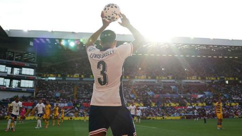 Myles Lewis-Skelly takes a throw-in against Andorra