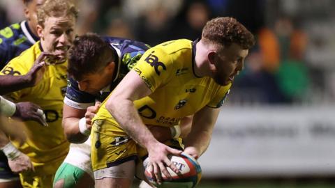 Dragons centre Angus O'Brien is tackled