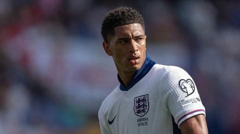 Jude Bellingham wearing an England shirt 